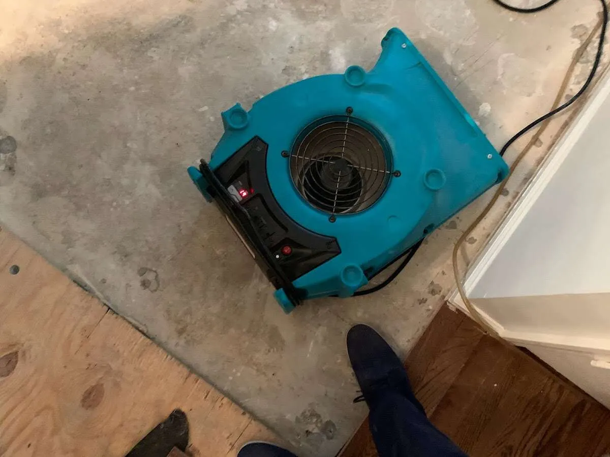 Air mover drying subfloor during Leak Detection & Repair in Trophy Club